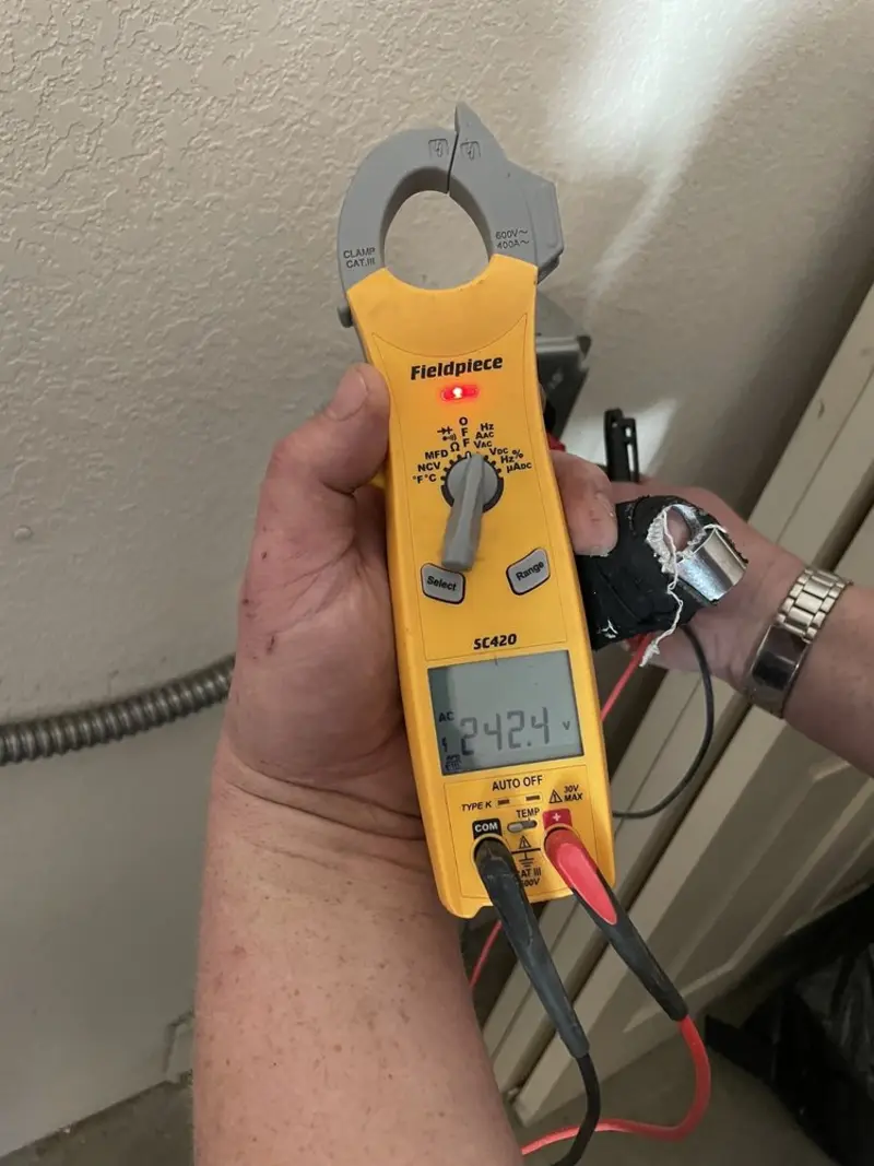 Voltage testing with clamp meter during Hot Tub / Pool Electrical Wiring in Plumsted